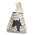 Bolso de nudo crudo con gatos