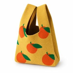 Bolso de mano amarillo con naranjas